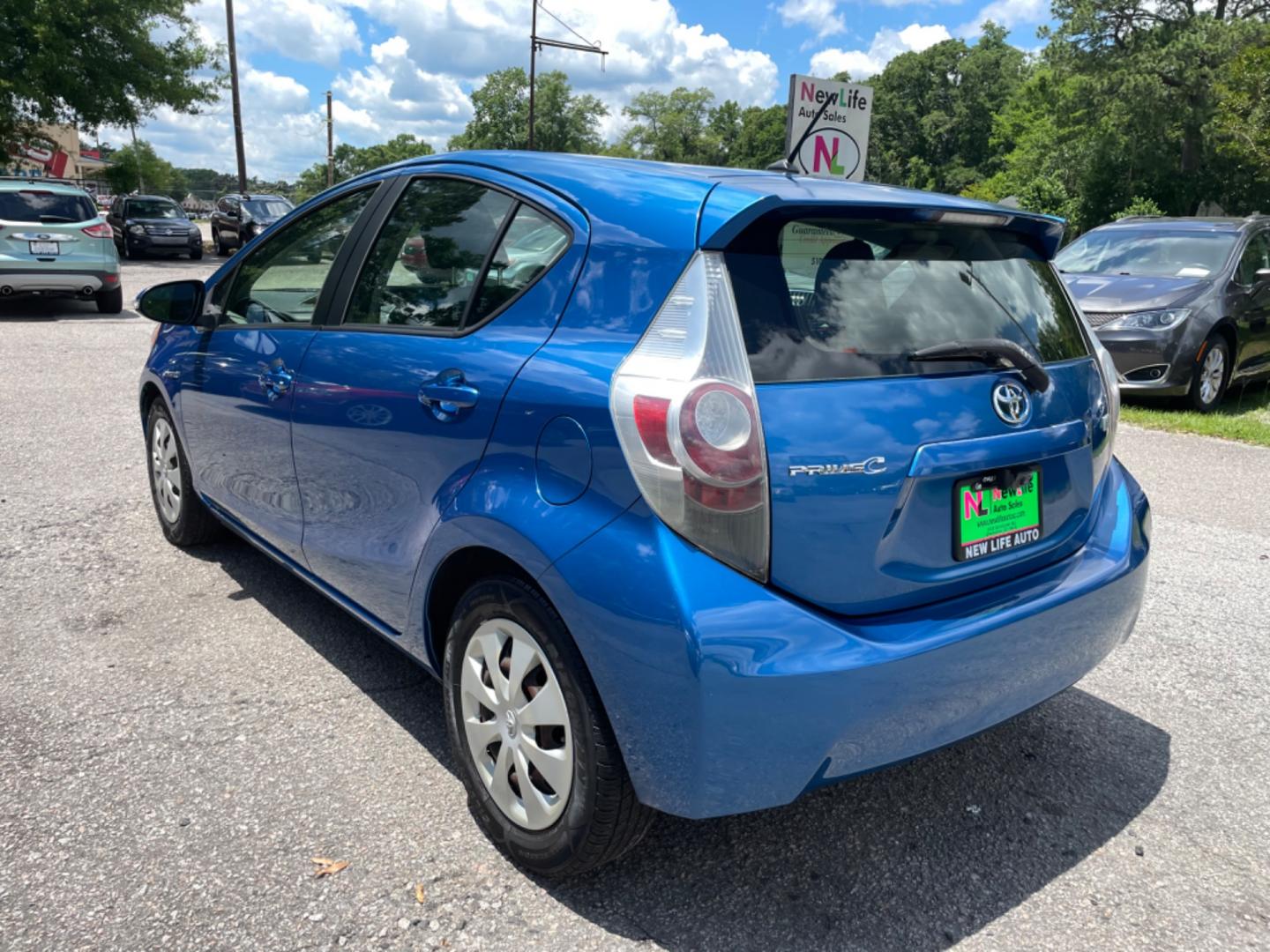 2013 BLUE TOYOTA PRIUS C ONE (JTDKDTB34D1) with an 1.5L engine, Continuously Variable transmission, located at 5103 Dorchester Rd., Charleston, SC, 29418-5607, (843) 767-1122, 36.245171, -115.228050 - Super clean interior with CD/AUX/Bluetooth, Power Windows, Power Locks, Power Mirrors, Spacious Cargo for it's size, Keyless Entry. Local Trade-in! Certified ONE Owner Vehicle!! 122k miles Located at New Life Auto Sales! 2023 WINNER for Post & Courier's Charleston's Choice Pre-owned Car Dealer AND - Photo#4